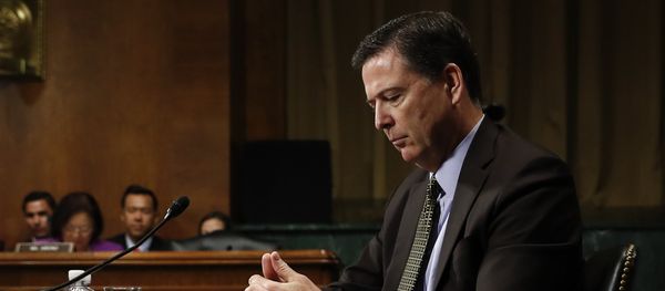 In this Wednesday, May 3, 2017, photo then-FBI Director James Comey pauses as he testifies on Capitol Hill in Washington, before a Senate Judiciary Committee hearing - Sputnik International