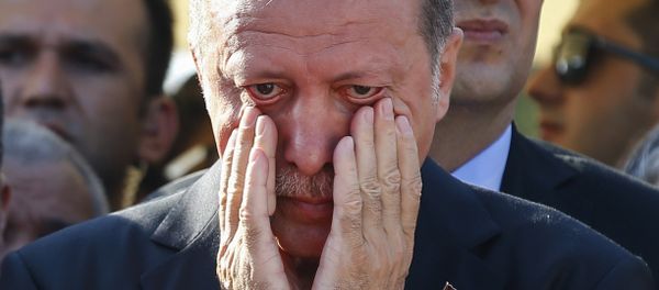 Turkish President Recep Tayyip Erdogan, right, wipes his tears Turkish President Recep Tayyip Erdogan, right, wipes his tears - Sputnik International