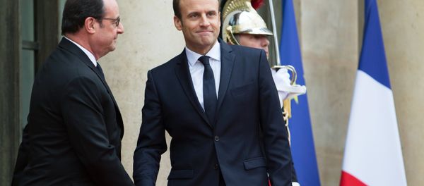 French President Francois Hollande, left, and President-elect Emmanuel Macron, front left to right, at Macron's inauguration in Paris. French President Francois Hollande, left, and President-elect Emmanuel Macron, front left to right, at Macron's inauguration in Paris. - Sputnik International
