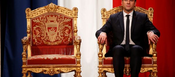 French President Emmanuel Macron listens as Paris Mayor Anne Hidalgo delivers her speech during a ceremony at the Hotel de Ville in Paris, France, May 14, 2017. French President Emmanuel Macron listens as Paris Mayor Anne Hidalgo delivers her speech during a ceremony at the Hotel de Ville in Paris, France, May 14, 2017. - Sputnik International