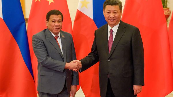 Chinese President Xi Jinping (R) shakes hands with Philippines President Rodrigo Duterte prior to their bilateral meeting during the Belt and Road Forum, at the Great Hall of the People in Beijing, China May 15, 2017. Chinese President Xi Jinping (R) shakes hands with Philippines President Rodrigo Duterte prior to their bilateral meeting during the Belt and Road Forum, at the Great Hall of the People in Beijing, China May 15, 2017. - Sputnik International