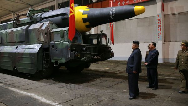 North Korean leader Kim Jong Un inspects the long-range strategic ballistic rocket Hwasong-12 (Mars-12) in this undated photo released by North Korea's Korean Central News Agency (KCNA) on May 15, 2017. North Korean leader Kim Jong Un inspects the long-range strategic ballistic rocket Hwasong-12 (Mars-12) in this undated photo released by North Korea's Korean Central News Agency (KCNA) on May 15, 2017. - Sputnik International
