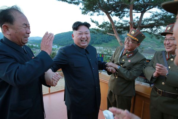 North Korean leader Kim Jong Un reacts with members of the Korean People's Army scientists and engineers in this undated photo released by North Korea's Korean Central News Agency (KCNA) on May 15, 2017. North Korean leader Kim Jong Un reacts with members of the Korean People's Army scientists and engineers in this undated photo released by North Korea's Korean Central News Agency (KCNA) on May 15, 2017. - Sputnik International