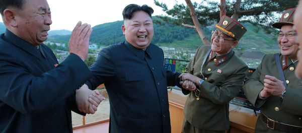 North Korean leader Kim Jong Un reacts with members of the Korean People's Army scientists and engineers in this undated photo released by North Korea's Korean Central News Agency (KCNA) on May 15, 2017. North Korean leader Kim Jong Un reacts with members of the Korean People's Army scientists and engineers in this undated photo released by North Korea's Korean Central News Agency (KCNA) on May 15, 2017. - Sputnik International