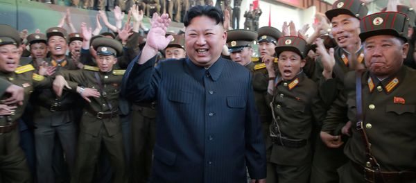 North Korean leader Kim Jong Un reacts with members of the Korean People's Army in this undated photo released by North Korea's Korean Central News Agency (KCNA) on May 15, 2017. - Sputnik International