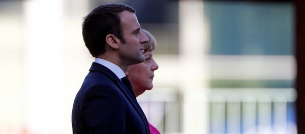 German Chancellor Angela Merkel and French President Emmanuel Macron listen to national anthems during a ceremony at the Chancellery in Berlin, Germany, May 15, 2017. German Chancellor Angela Merkel and French President Emmanuel Macron listen to national anthems during a ceremony at the Chancellery in Berlin, Germany, May 15, 2017. - Sputnik International