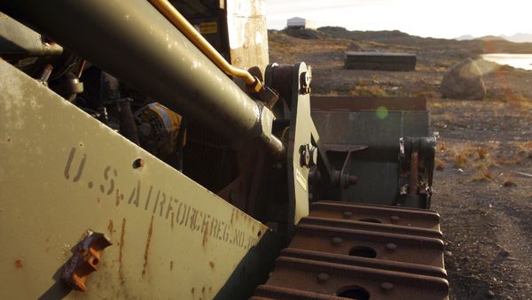 An abandoned US Air Force vehicle is seen on Aug. 16, 2005, outside the eastern Greenland settlement of Kulusuk where there used to be a U.S. Air Force base as part of an early warning radar system. An abandoned US Air Force vehicle is seen on Aug. 16, 2005, outside the eastern Greenland settlement of Kulusuk where there used to be a U.S. Air Force base as part of an early warning radar system. - Sputnik International