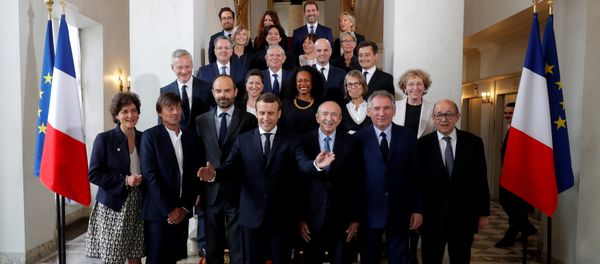 French President Emmanuel Macron (4thL) and Prime Minister Edouard Philippe (3rdL) pose for a family photo after the first cabinet meeting at the Elysee Palace in Paris, France, May 18, 2017. - Sputnik International
