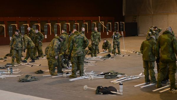 Soldiers and Airmen with the Minnesota National Guard begin the process of adjusting the binding mechanics on their Nordic skis at Camp Vaernes, Norway, on Feb. 11, 2017. Soldiers and Airmen with the Minnesota National Guard begin the process of adjusting the binding mechanics on their Nordic skis at Camp Vaernes, Norway, on Feb. 11, 2017. - Sputnik International