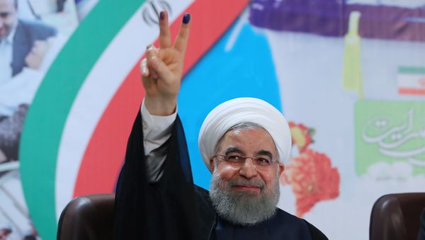 Iran's President Hassan Rouhani gestures as he registers to run for a second four-year term in the May election, in Tehran, Iran, April 14, 2017. Iran's President Hassan Rouhani gestures as he registers to run for a second four-year term in the May election, in Tehran, Iran, April 14, 2017. - Sputnik International