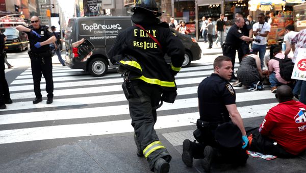 A New York City Fire Department (FDNY) emergency worker rushes to a scene in Times Square after a speeding vehicle struck pedestrians on the sidewalk in New York City, U.S., May 18, 2017. A New York City Fire Department (FDNY) emergency worker rushes to a scene in Times Square after a speeding vehicle struck pedestrians on the sidewalk in New York City, U.S., May 18, 2017. - Sputnik International