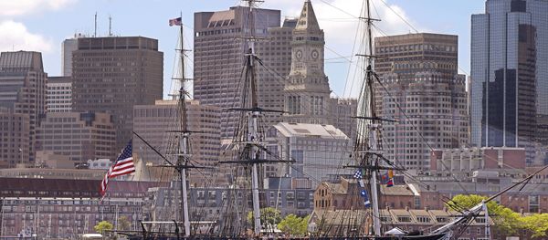 The USS Constitution, or Old Ironsides, the US Navy's oldest commissioned ship is towed through Boston Harbor past the financial district skyline in honor of the 70th Anniversary of D-Day Friday, June 6, 2014 in Boston. - Sputnik International