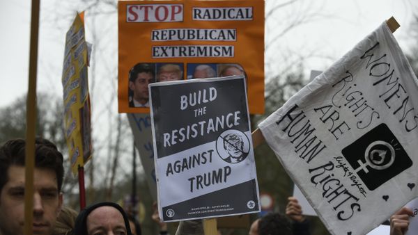 Protesters hold banners during a demonstration in Brussels (File) - Sputnik International