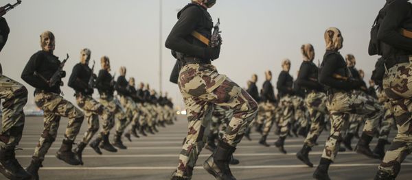 In this Sept. 17, 2015 file photo, Saudi security forces take part in a military parade in preparation for the annual Hajj pilgrimage in Mecca, Saudi Arabia. - Sputnik International