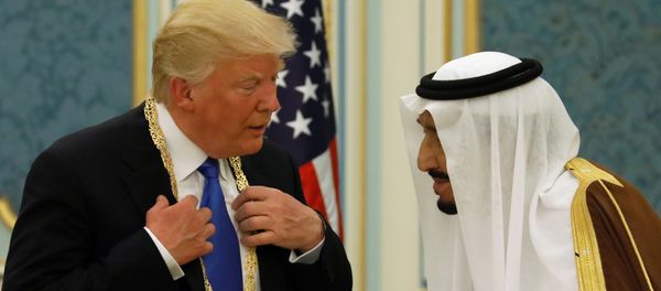 Saudi Arabia's King Salman bin Abdulaziz Al Saud (R) presents U.S. President Donald Trump with the Collar of Abdulaziz Al Saud Medal at the Royal Court in Riyadh, Saudi Arabia May 20, 2017 Saudi Arabia's King Salman bin Abdulaziz Al Saud (R) presents U.S. President Donald Trump with the Collar of Abdulaziz Al Saud Medal at the Royal Court in Riyadh, Saudi Arabia May 20, 2017 - Sputnik International