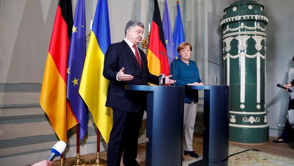 German Chancellor Angela Merkel and Ukrainian President Petro Poroshenko adress the media after a meeting at the German government guesthouse Meseberg Palace in Meseberg, Germany, May 20, 2017 German Chancellor Angela Merkel and Ukrainian President Petro Poroshenko adress the media after a meeting at the German government guesthouse Meseberg Palace in Meseberg, Germany, May 20, 2017 - Sputnik International