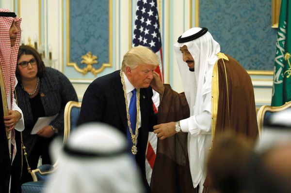 Saudi Arabia's King Salman bin Abdulaziz Al Saud (R) presents U.S. President Donald Trump (C) with the Collar of Abdulaziz Al Saud Medal at the Royal Court in Riyadh, Saudi Arabia May 20, 2017. Picture taken May 20, 2017 Saudi Arabia's King Salman bin Abdulaziz Al Saud (R) presents U.S. President Donald Trump (C) with the Collar of Abdulaziz Al Saud Medal at the Royal Court in Riyadh, Saudi Arabia May 20, 2017. Picture taken May 20, 2017 - Sputnik International