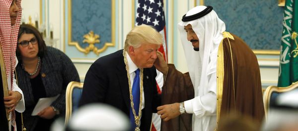 Saudi Arabia's King Salman bin Abdulaziz Al Saud (R) presents U.S. President Donald Trump (C) with the Collar of Abdulaziz Al Saud Medal at the Royal Court in Riyadh, Saudi Arabia May 20, 2017. Picture taken May 20, 2017 Saudi Arabia's King Salman bin Abdulaziz Al Saud (R) presents U.S. President Donald Trump (C) with the Collar of Abdulaziz Al Saud Medal at the Royal Court in Riyadh, Saudi Arabia May 20, 2017. Picture taken May 20, 2017 - Sputnik International