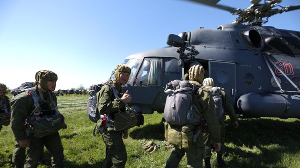Servicemen of a special purpose unit of Russia's Southern Military District during drills on airborne landing from the Mi-8AMTSh helicopters. File photo Servicemen of a special purpose unit of Russia's Southern Military District during drills on airborne landing from the Mi-8AMTSh helicopters. File photo - Sputnik International