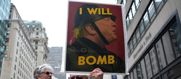 Anti-war protesters shout slogans against US President Donald Trump during a demonstration in front of the Trump Tower in New York on April 7, 2017, to protest the US air strike in Syria - Sputnik International