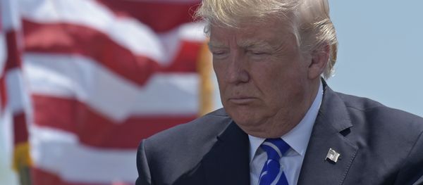 President Donald Trump attends the commencement address at the U.S. Coast Guard Academy in New London, Conn., Wednesday, May 17, 2017 - Sputnik International