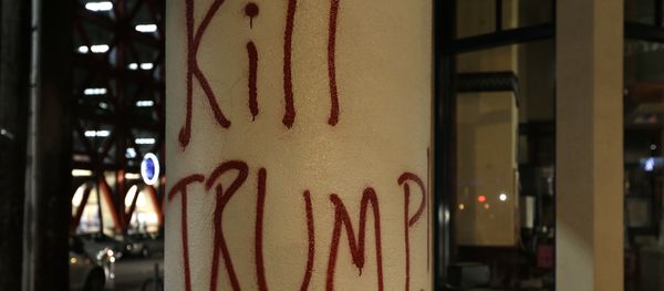 Graffiti left by protesters who were against a scheduled speaking appearance by Breitbart News editor Milo Yiannopoulos is seen Wednesday, Feb. 1, 2017, in Berkeley, Calif Graffiti left by protesters who were against a scheduled speaking appearance by Breitbart News editor Milo Yiannopoulos is seen Wednesday, Feb. 1, 2017, in Berkeley, Calif - Sputnik International