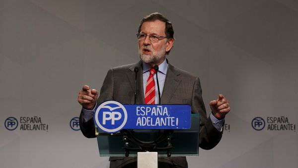 Spain's Prime Minister Mariano Rajoy gestures during a news conference at his ruling People's Party's (PP) headquarters in Madrid, Spain May 22, 2017 - Sputnik International