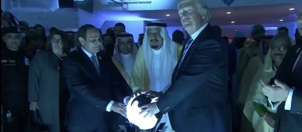 U.S. President Donald Trump places his hands on a glowing orb as he tours with other leaders the Global Center for Combatting Extremist Ideology in Riyadh, Saudi Arabia May 21, 2017 U.S. President Donald Trump places his hands on a glowing orb as he tours with other leaders the Global Center for Combatting Extremist Ideology in Riyadh, Saudi Arabia May 21, 2017 - Sputnik International