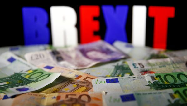 Euro and pound banknotes are seen in front of BREXIT letters in this picture illustration taken April 28, 2017. - Sputnik International