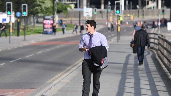 Commuters walk near Victoria station in Manchester, northwest England on May 23, 2017. Commuters walk near Victoria station in Manchester, northwest England on May 23, 2017. - Sputnik International
