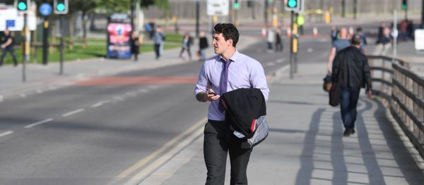 Commuters walk near Victoria station in Manchester, northwest England on May 23, 2017. - Sputnik International