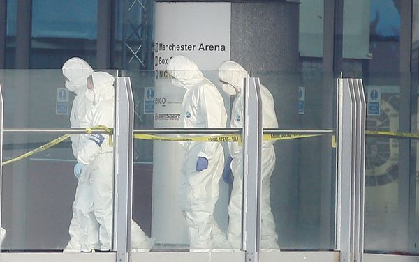 Forensics investigators work at the entrance of the Manchester Arena, Britain May 23, 2017. Forensics investigators work at the entrance of the Manchester Arena, Britain May 23, 2017. - Sputnik International