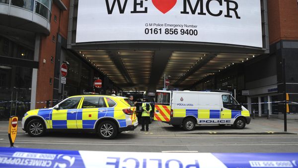 Police evacuate the Arndale shopping centre, in Manchester, England Tuesday May 23, 2017, the day after an apparent suicide bomber attacked an Ariana Grande concert as it ended Monday night, killing over a dozen of people among a panicked crowd of young concertgoers. Police evacuate the Arndale shopping centre, in Manchester, England Tuesday May 23, 2017, the day after an apparent suicide bomber attacked an Ariana Grande concert as it ended Monday night, killing over a dozen of people among a panicked crowd of young concertgoers. - Sputnik International