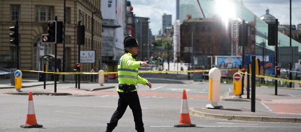 A police officer potrols a cordon near to the Manchester Arena in Manchester, northwest England on May 23, 2017 - Sputnik International