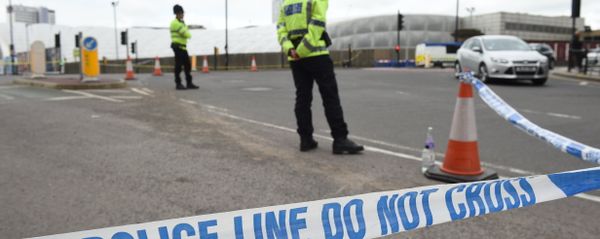 A police cordon surrounds Manchester Arena in Manchester, northwest England following the deadly terror attacks on May 23, 2017. - Sputnik International