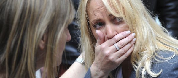 A member of the public reacts as police evacuate the Arndale shopping centre, in Manchester, England Tuesday May 23, 2017, the day after an apparent suicide bomber attacked an Ariana Grande concert as it ended Monday night, killing over a dozen of people among a panicked crowd of young concertgoers. - Sputnik International