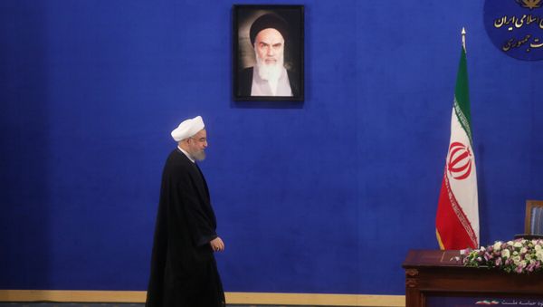 Iranian president Hassan Rouhani arrives for a news conference in Tehran, Iran, May 22, 2017. - Sputnik International