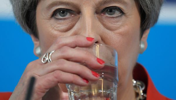Britain's Prime Minister Theresa May sips water as she speaks at an election campaign event in Wrexham, Wales May 22, 2017. Britain's Prime Minister Theresa May sips water as she speaks at an election campaign event in Wrexham, Wales May 22, 2017. - Sputnik International