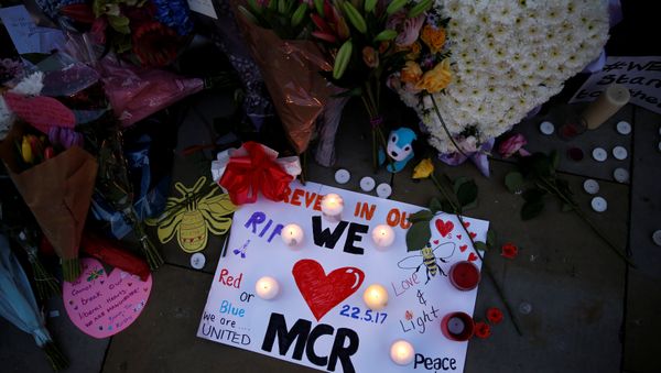 Flowers and messages are left for the victims of the Manchester Arena attack in central Manchester, Britain May 23, 2017. Flowers and messages are left for the victims of the Manchester Arena attack in central Manchester, Britain May 23, 2017. - Sputnik International