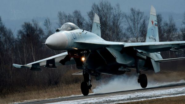 Su-27SM fighter lands as part of the tactical flight drill by fighter aircraft of the Eastern Military District conducted at Tsentralnaya Uglovaya military airfield in Primorye Territory. - Sputnik International