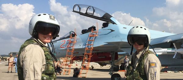Russian pilots prepared to board the SU-30 attack plane to take off from the Hmeymim aerodrome in Syria. File photo - Sputnik International