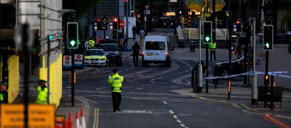 Police patrol the secure area outside the Manchester Arena in central Manchester, Britain May 23, 2017. Police patrol the secure area outside the Manchester Arena in central Manchester, Britain May 23, 2017. - Sputnik International