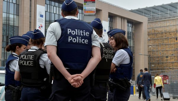 Belgian police officers patrol the area around the headquarters of different European institutions in Brussels, Belgium May 24, 2017. Belgian police officers patrol the area around the headquarters of different European institutions in Brussels, Belgium May 24, 2017. - Sputnik International