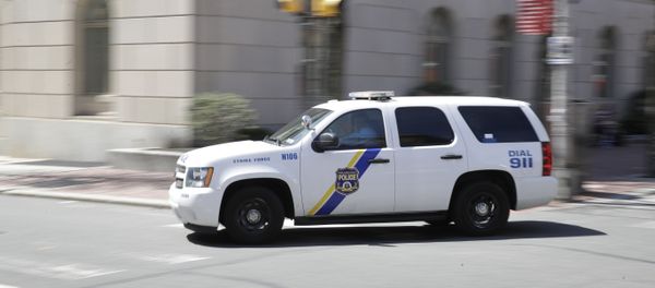 A police department vehicle drives to a call A police department vehicle drives to a call - Sputnik International