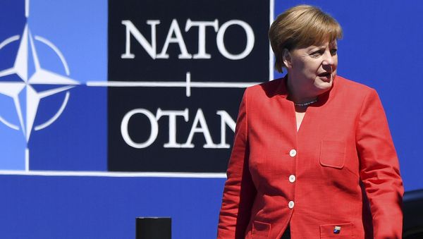 German Chancellor Angela Merkel arrives for the NATO summit in Brussels German Chancellor Angela Merkel arrives for the NATO summit in Brussels - Sputnik International