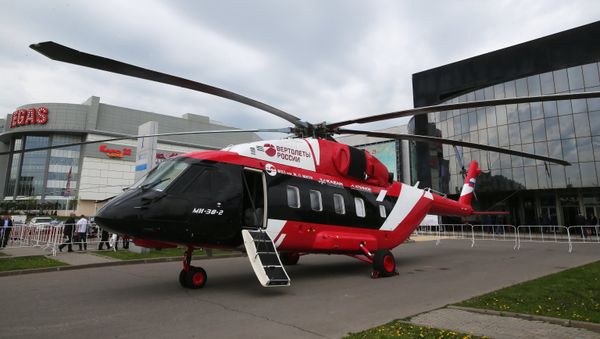 A Mi-38-2 (OP-3) cargo and passenger helicopter displayed at the HeliRussia 10th international helicopter expo at the Crocus Expo international exhibition center in Moscow. - Sputnik International