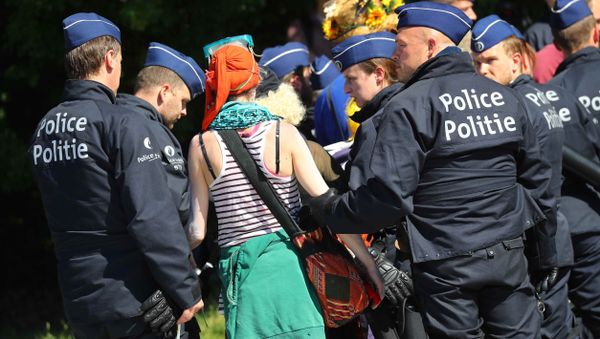 Demonstrators are led away by police during a protest against a NATO summit in Brussels, Belgium Demonstrators are led away by police during a protest against a NATO summit in Brussels, Belgium - Sputnik International