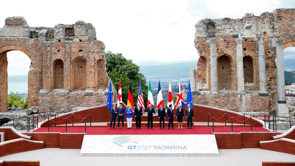 From L-R, European Council President Donald Tusk, Canadian Prime Minister Justin Trudeau, German Chancellor Angela Merkel, U.S. President Donald Trump, Italian Prime Minister Paolo Gentiloni, French President Emmanuel Macron, Japanese Prime Minister Shinzo Abe, Britain’s Prime Minister Theresa May and European Commission President Jean-Claude Juncker pose for a family photo during the G7 Summit in Taormina, Sicily, Italy, May 26, 2017. From L-R, European Council President Donald Tusk, Canadian Prime Minister Justin Trudeau, German Chancellor Angela Merkel, U.S. President Donald Trump, Italian Prime Minister Paolo Gentiloni, French President Emmanuel Macron, Japanese Prime Minister Shinzo Abe, Britain’s Prime Minister Theresa May and European Commission President Jean-Claude Juncker pose for a family photo during the G7 Summit in Taormina, Sicily, Italy, May 26, 2017. - Sputnik International