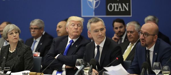 British Prime Minister Theresa May, U.S. President Donald Trump and NATO Secretary General Jens Stoltenberg listen to Belgian Prime Minister Charles Michel as he speaks during a working dinner meeting at the NATO headquarters during a NATO summit of heads of state and government in Brussels on Thursday, May 25, 2017 British Prime Minister Theresa May, U.S. President Donald Trump and NATO Secretary General Jens Stoltenberg listen to Belgian Prime Minister Charles Michel as he speaks during a working dinner meeting at the NATO headquarters during a NATO summit of heads of state and government in Brussels on Thursday, May 25, 2017 - Sputnik International