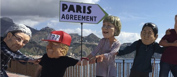 Oxfam activists wearing masks of the leaders of the G7 summit; from left, Italian Premier Paolo Gentiloni, US President Donald Trump, German Chancellor Angela Merkel, Japanese Prime Minister Shinzo Abe, French President Emmanuel Macron and Canadian Prime Minister Justin Trudeau, stage a demonstration in Giardini Naxos, near the venue of the G7 summit in the Sicilian town of Taormina, southern Italy, Friday, May 26, 2017 Oxfam activists wearing masks of the leaders of the G7 summit; from left, Italian Premier Paolo Gentiloni, US President Donald Trump, German Chancellor Angela Merkel, Japanese Prime Minister Shinzo Abe, French President Emmanuel Macron and Canadian Prime Minister Justin Trudeau, stage a demonstration in Giardini Naxos, near the venue of the G7 summit in the Sicilian town of Taormina, southern Italy, Friday, May 26, 2017 - Sputnik International